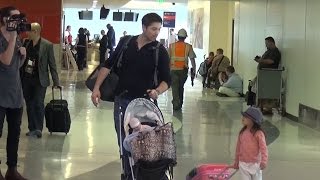 Adorable Family, Roselyn Sanchez, Eric Winter, And Daughter Pass Through LAX