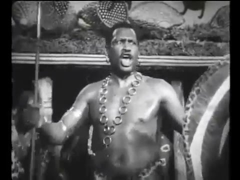 Chief Bosambo (Paul Robeson) in good voice, rallying his tribespeople