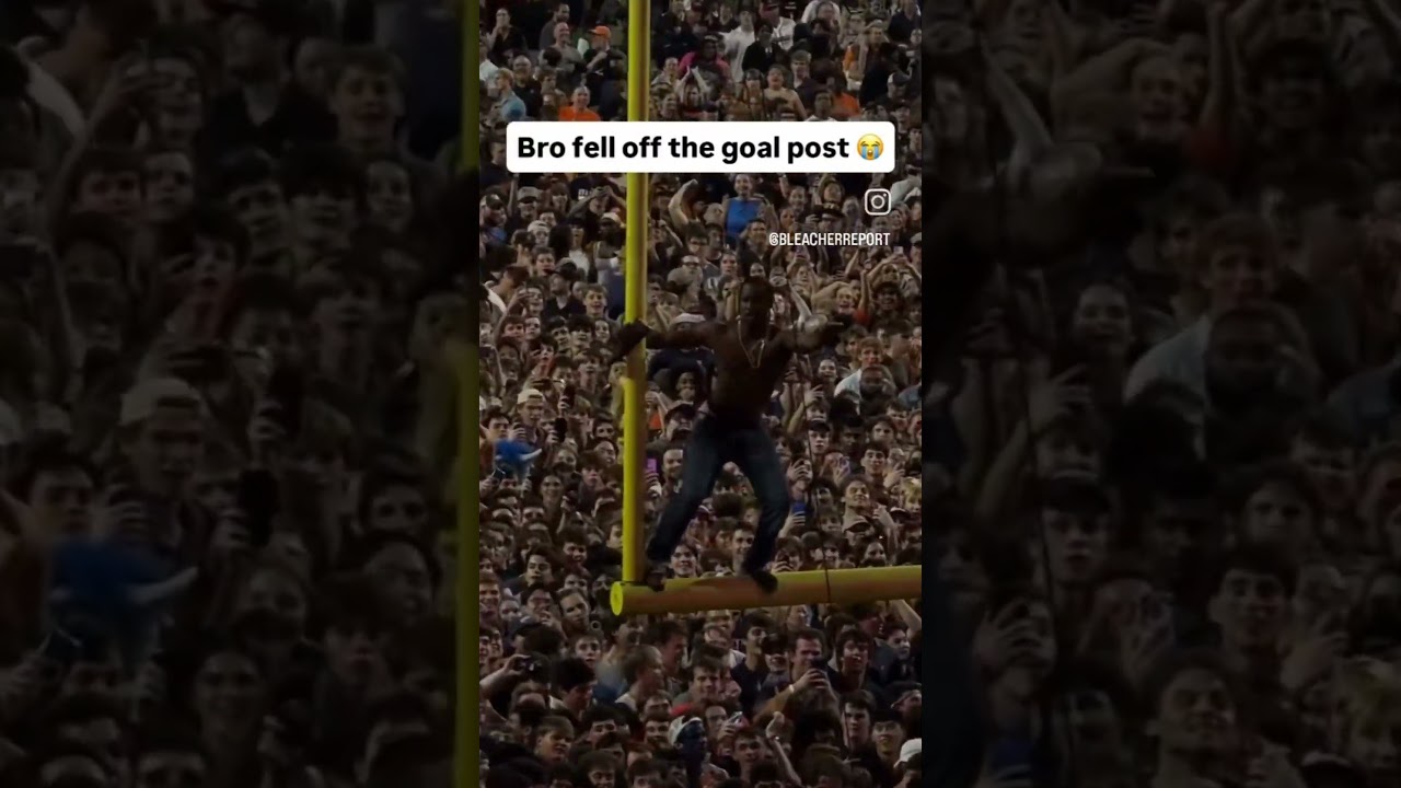 Fan falls Off Goal Post After UVA upsets FSU 