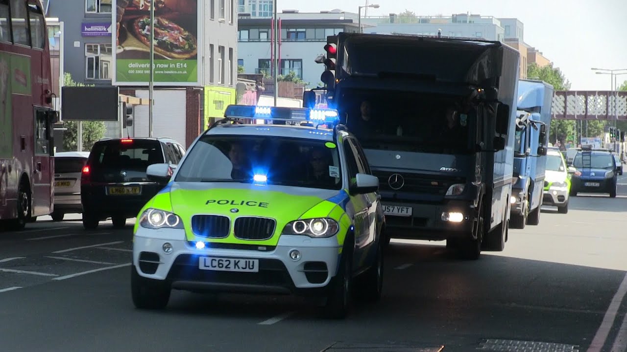 blue vans police escort