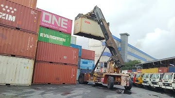 Kalmar Reach stacker with a tilting spreader for container handling