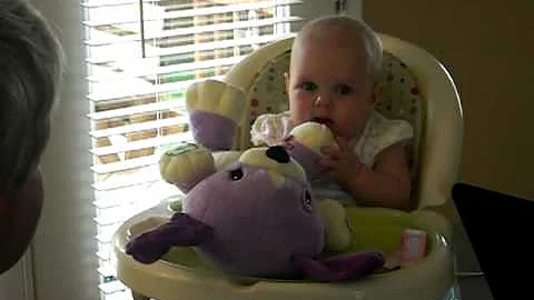 2010-07-17 Lily and new toy from Renee Abel.MOV