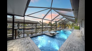 Experience waterfront living at its finest in this canal-front home in Rockledge, FL | $1,470,000