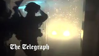 video: Tensions flare as police clash with worshippers during raid at Jerusalem mosque