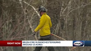 Crews from several towns fight Manchester brush fire