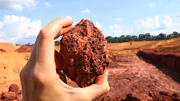 Qual é a origem das jazidas minerais?