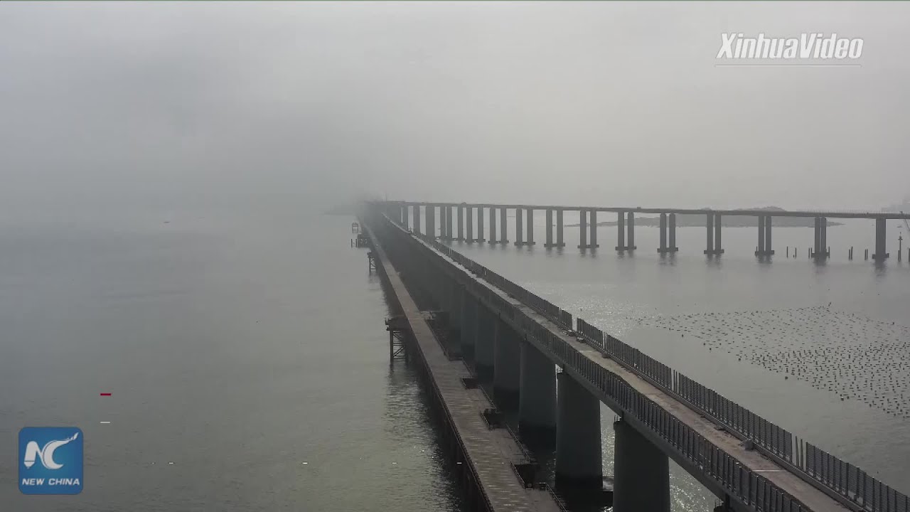 Track-laying starts for world's longest cross-sea road-rail bridge