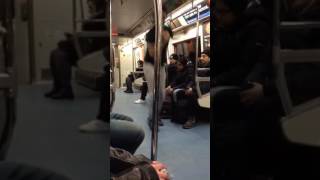 Guy doing insane tricks with his hat on the NYC subway