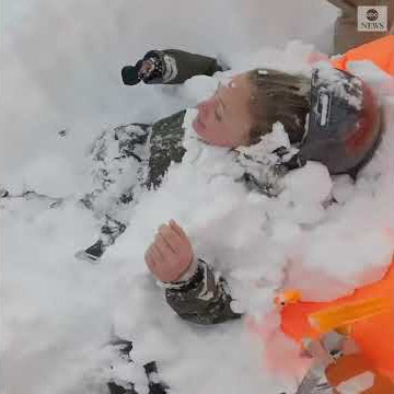 Snowboarders rescue two people buried in avalanche | ABC News