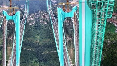 2,2 miljard yuan, 2 minuten, 1 wonder — De hoogste brug ter wereld, Huajiang Grand Canyon Bridge.