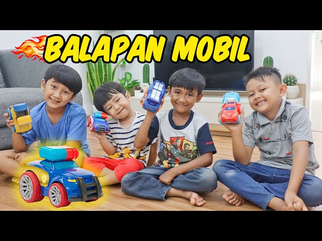 Ziyan dan Teman Teman Balapan Mobil UZoom class=