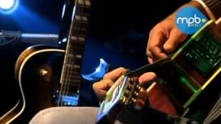 Video thumbnail of "Carlinhos Brown - Covered Saints (Acústico)"