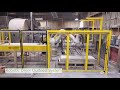 Robotic dryer outfeed system by convey