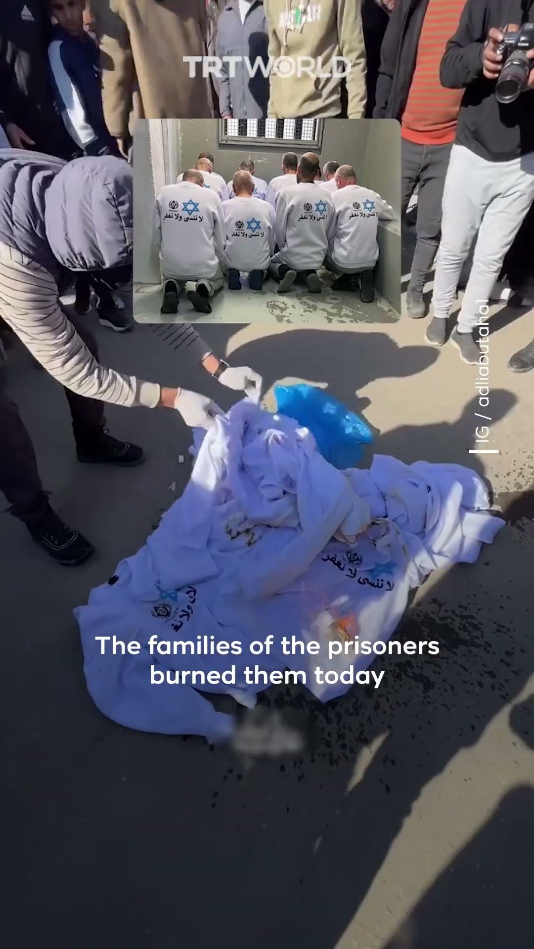 Palestinians burn clothing forced on detainees at release