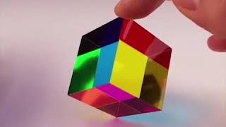 A demonstration of subtractive color mixing with a CMY cube.