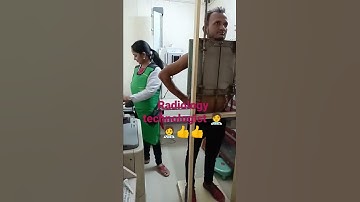 Radiology technologist doing chest x- ray