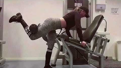 Glutes workout in leg curl machine