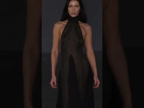 Bella Hadid walking braless for Ludovic de Saint Sernin in see through dress