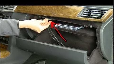 How To Locate The Auxiliary Music Plug For A Mercedes Benz 2011 E350 Convertible