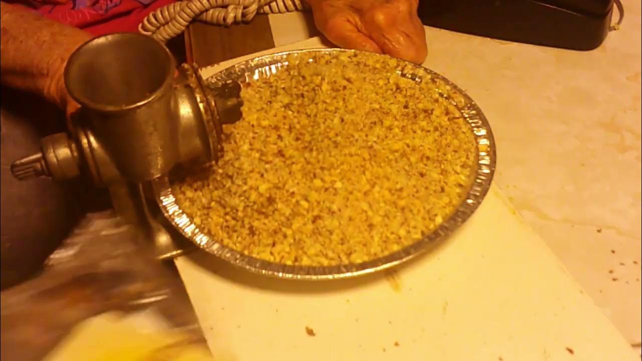 Grinding hazelnuts with hand crank meat grinder. YouTube