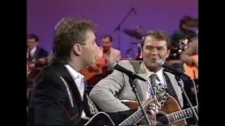Video thumbnail of "Steve Wariner and Glen Campbell Sing "The Hand That Rocks the Cradle""