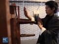 Kung Fu masters fight against wooden dummies in SE China Kung Fu masters fight against wooden dummies in SE China