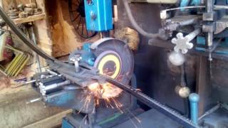 Automatic bandsaw blade sharpening machine