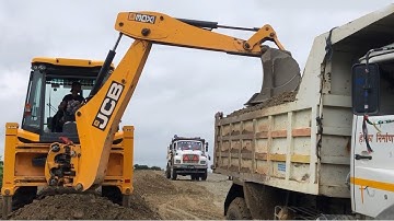 JCB Backhoe 3Dx Machine Loader Loading Gravel in Dump Truck
