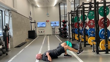 Hamstring curl + hip extension w/ single leg glute bridge