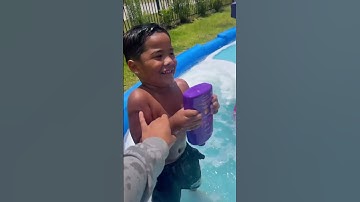 Thumbnail of Mom catches dad and son not cleaning water slide after she told them to #shorts