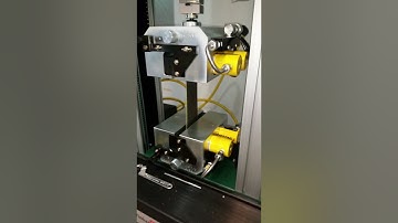 Tensile Test on 90mm Webbing using a Tinius Olsen 50ST Material Testing Machine with Hydraulic Grips