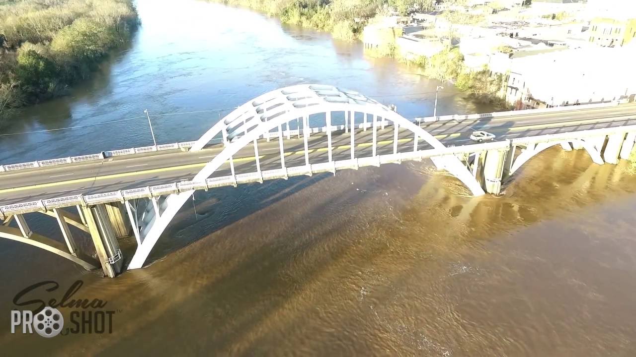 Aerial footage Alabama River Selma, AL Edmund Pettus Bridge