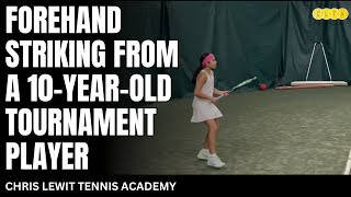 Forehand striking 10 years old tournament player