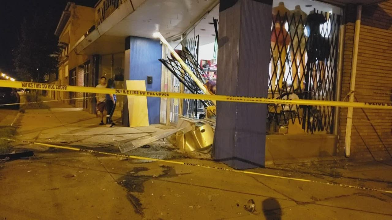 Vehicle crashes into storefront in SE Grand Rapids