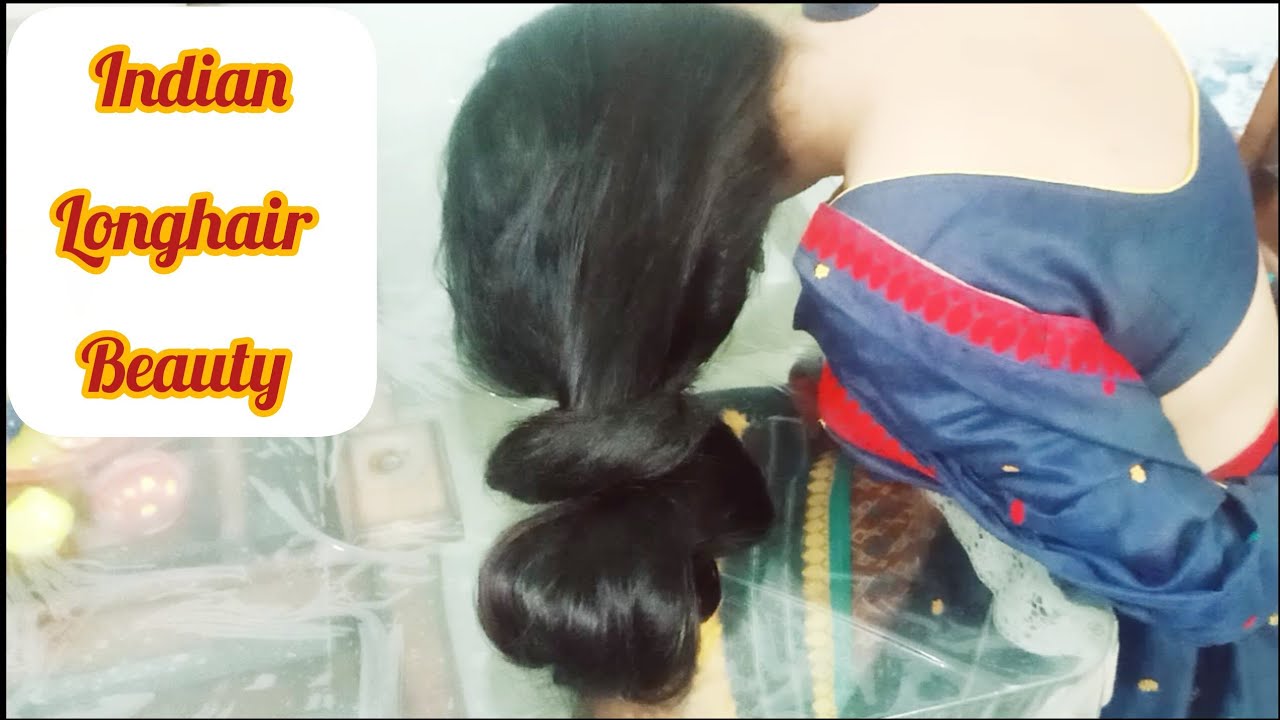 Indian longhair beauty with beautiful traditional saree