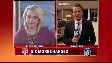 Six State Employees Charged in Flint Water Crisis