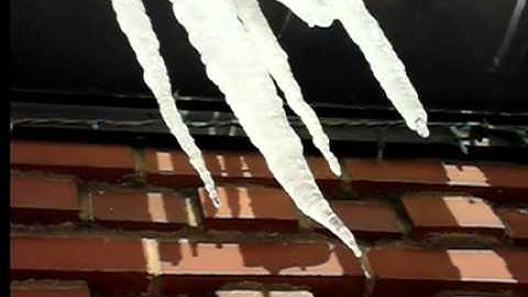 Super slow motion of water droplet off icecicle. 240FPS