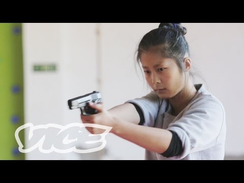 Female bodyguards latest accessory for China's rich