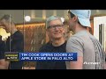 Tim Cook visits Apple Store as new iPhones go on sale