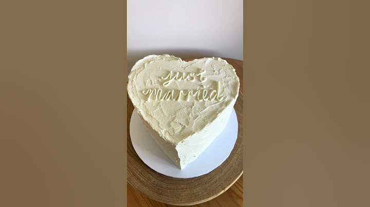 A rough textured love heart cake for a small wedding celebration at Bendooley Estate Bookbarn #cake