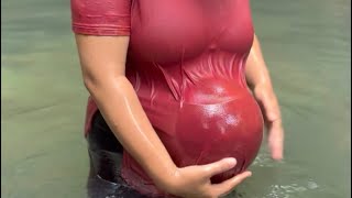 A Pregnant Woman Goes To The River  Arini Afriani