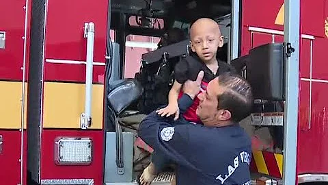 Firefighters help young boy with cancer gear up for bone marrow transplant