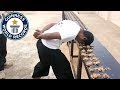 Most walnuts cracked against the head in one minute - Guinness World Records