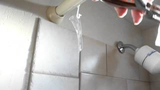 FIXING A PLASTIC SHOWER CURTAIN WITH TAPE / HOLE PUNCH