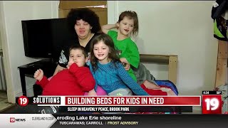 ‘No kid sleeps on the floor in our town’: Brook Park volunteers build beds for kids in need