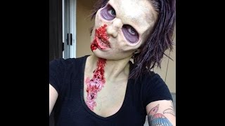 Zombie makeup with zombie prosthetic