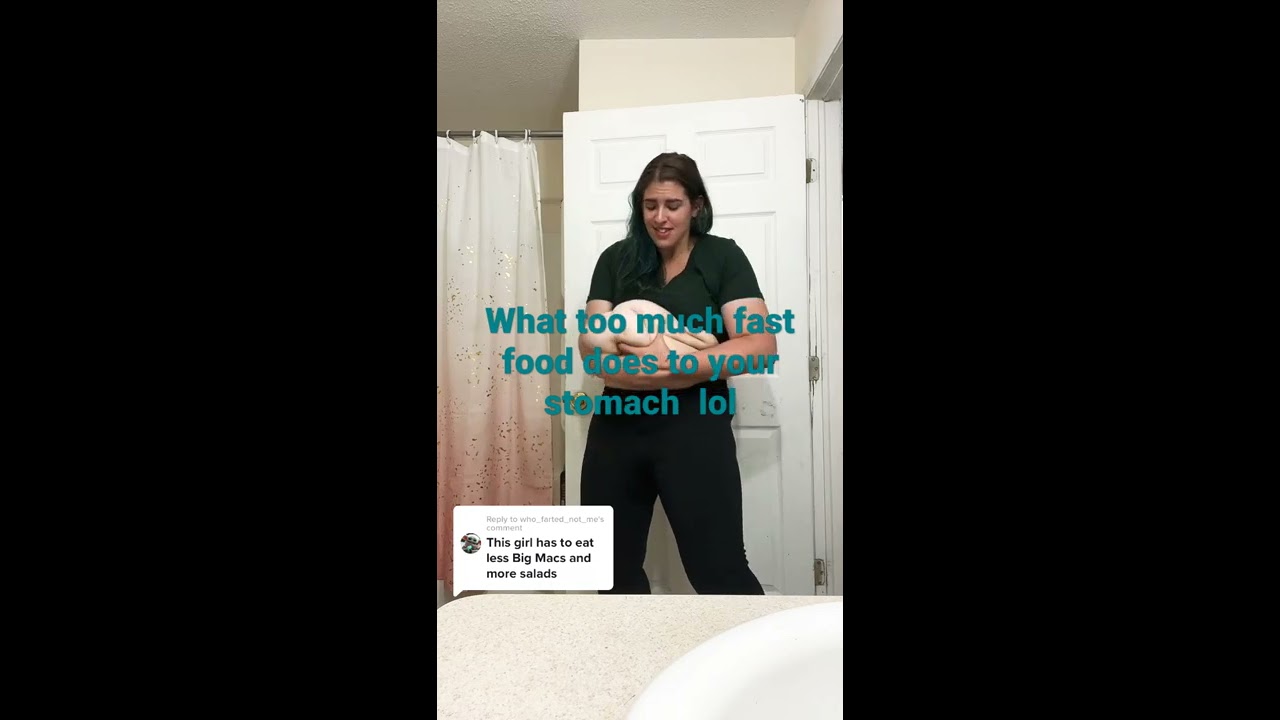 Women Shows Off Her Huge Belly From Eating Fast Food Lol
