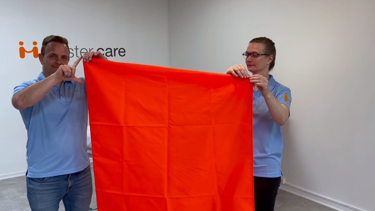 Tag bukser af sengeliggende bruger med glidedug