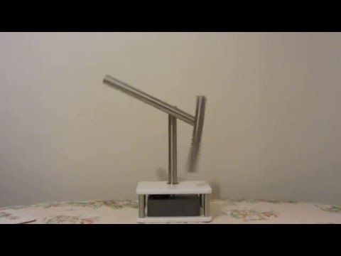 spinning sticks kinetic desk sculpture