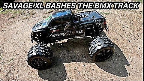 HPI Savage xl 5.9 jumps and bash the BMX track